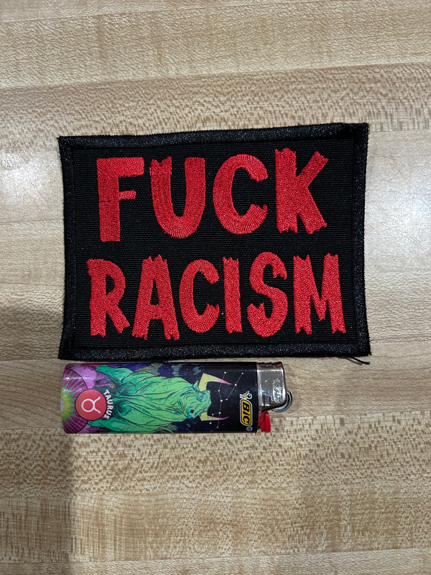 Fuck Racism bold squared